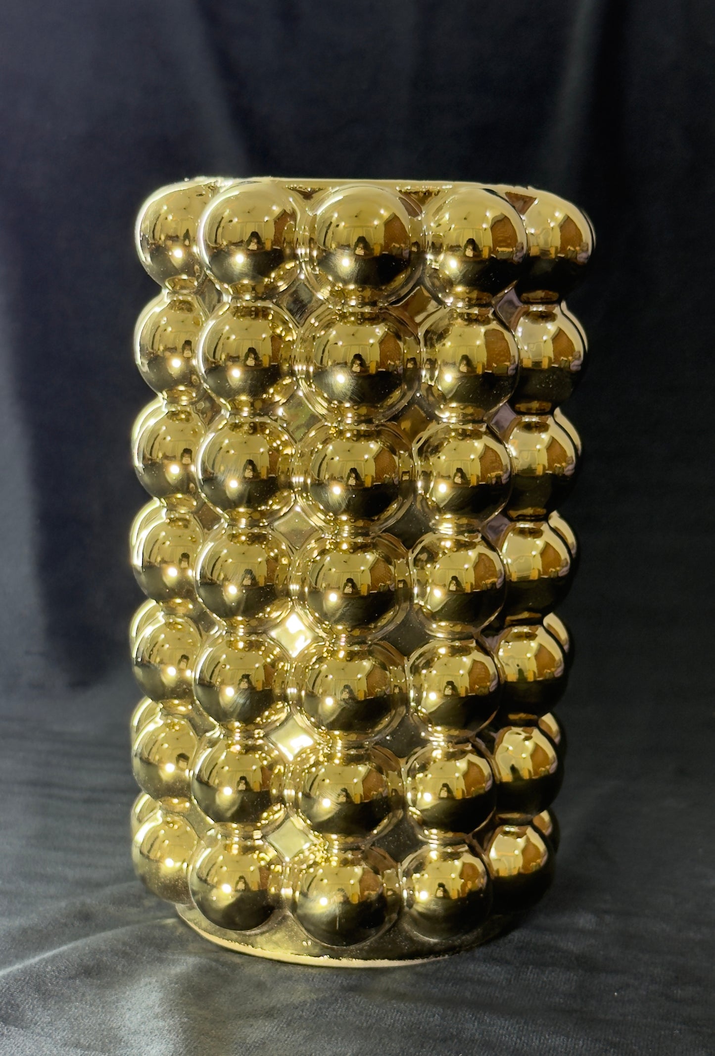 Golden ceramic bubble vase